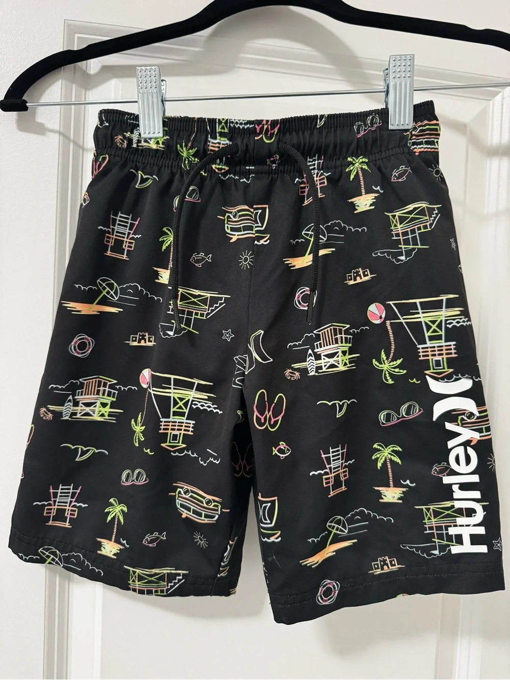 Boy’s Hurley Black Swim Shorts with Neon Lifeguard & Beach Print.